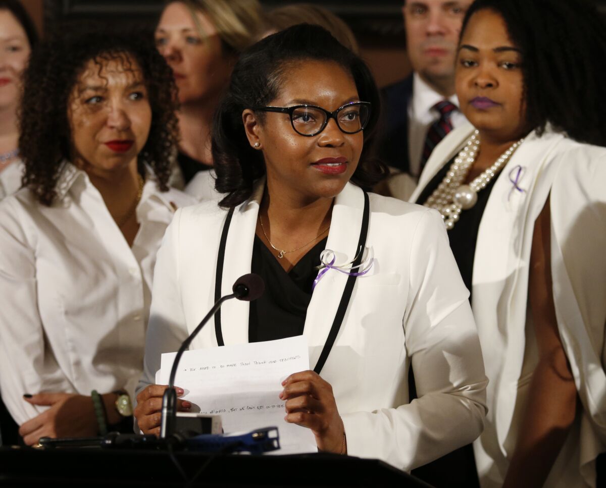 FILE – In this March 5, 2019 file photo, Ohio House minority leader Emilia Sykes delivers the Democrat's response to the Gov. Mike DeWine's State of the State address at the Ohio Statehouse in Columbus, Ohio. Sykes said Tuesday, Jan. 18, 2022 that she's running for Congress, setting up a likely face off in a potentially newly competitive northeast Ohio district against Trump-backed Republican Max Miller. (AP Photo/Paul Vernon, File)