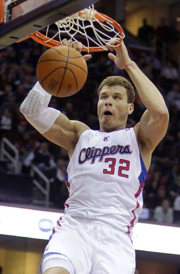 Clippers power forward Blake Griffin puts down a dunk against the Cavaliers in the fourth quarter Wednesday night in Cleveland.