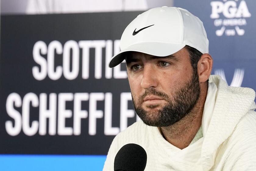 Scottie Scheffler speaks during a news conference during the PGA Championship golf tournament at the Valhalla Golf Club, Tuesday, May 14, 2024, in Louisville, Ky. (AP Photo/Sue Ogrocki)