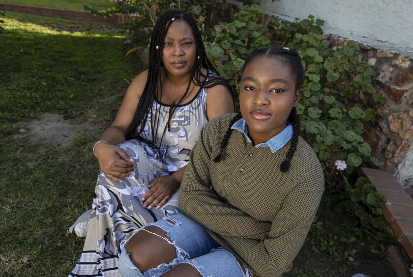Destiny Helligar, 15, right, and her mother, Carmenita Helligar.