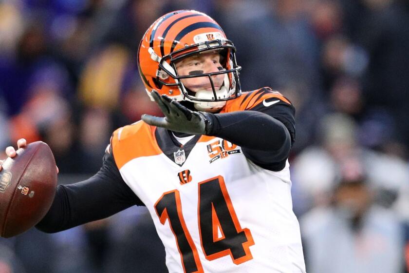 BALTIMORE, MD - DECEMBER 31: Quarterback Andy Dalton #14 of the Cincinnati Bengals throws the ball in the first quarter against the Baltimore Ravens at M&T Bank Stadium on December 31, 2017 in Baltimore, Maryland. (Photo by Patrick Smith/Getty Images) ** OUTS - ELSENT, FPG, CM - OUTS * NM, PH, VA if sourced by CT, LA or MoD **