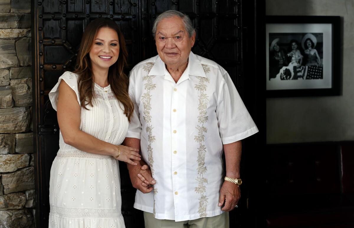 Second-generation Casa Vega owner Christy Vega Fowler holds hands with her father, Rafael "Ray" Vega.