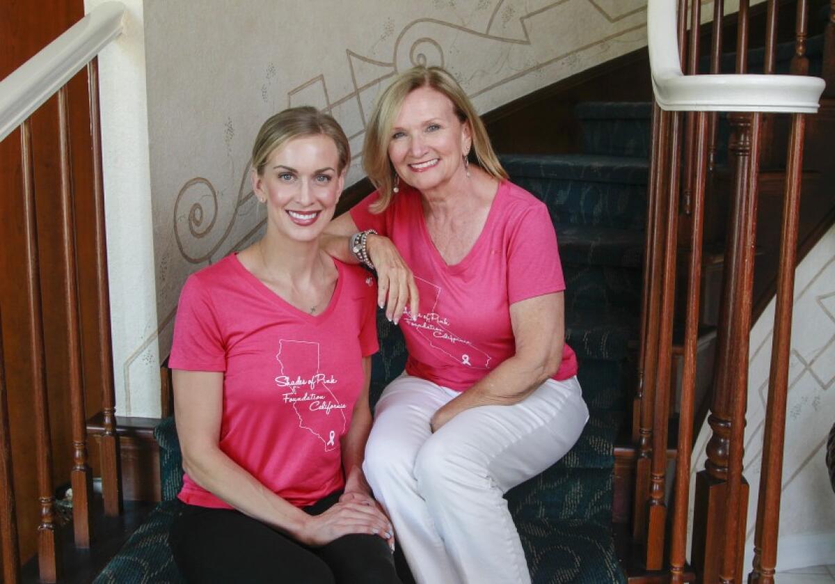 Vembra Holnagel, right, and her daughter Kianne Farmer, of the Shades of Pink Foundation California, pose for photos at Holnagel’s Encinitas home.