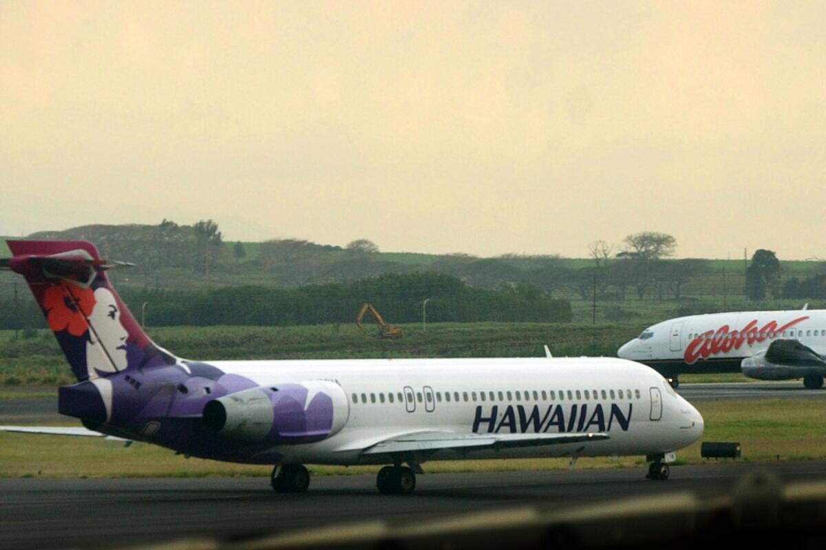 Hawaiian Airlines plane on runway