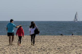 SANTA MONICA, CA - JULY 3, 2020: In what would have been the start of a crowded beach weekend, very few people defied the counties order to go to Santa Monica Beach on Friday as all beaches in L.A. County are closed due to the coronavirus pandemic on July 3, 2020 in Santa Monica, California. (Gina Ferazzi / Los Angeles Times)