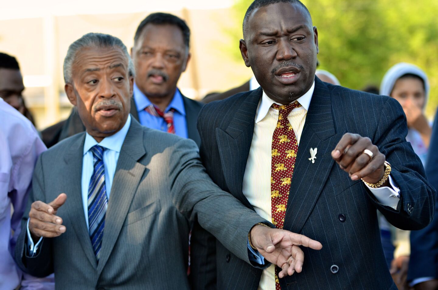 The Rev. Al Sharpton, Jesse Jackson and Benjamin Crump, attorney for the Trayvon Martin family, join together in Sanford on March 26. More: Demanding George Zimmerman be arrested