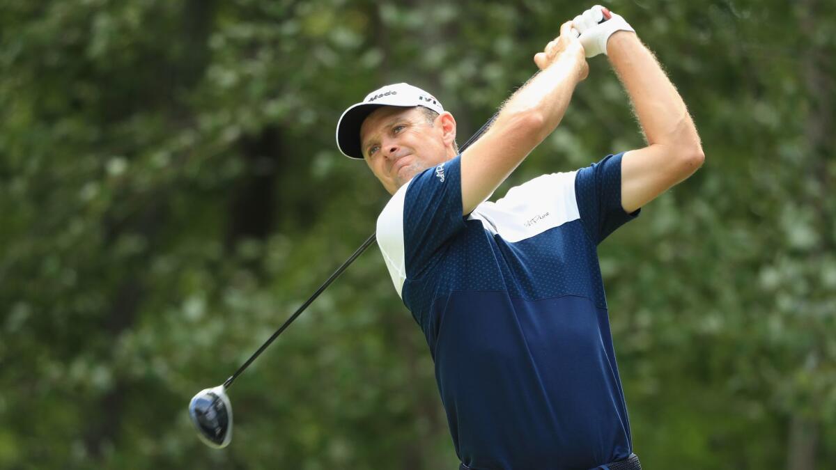 Justin Rose of England plays his shot from the second tee during the first round of the Dell Technologies Championship at TPC Boston.