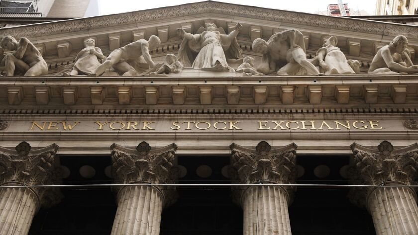 The facade of the New York Stock Exchange is shown.