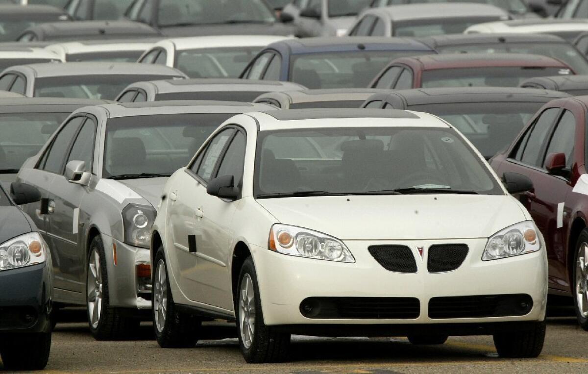 A Pontiac G6 is shown in 2005 outside the General Motors Orion Assembly plant in Orion Township, Mich.