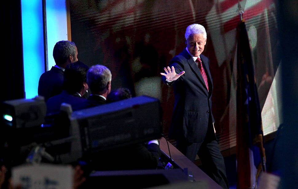 Former President Clinton arrives for his speech at the Democratic National Convention.
