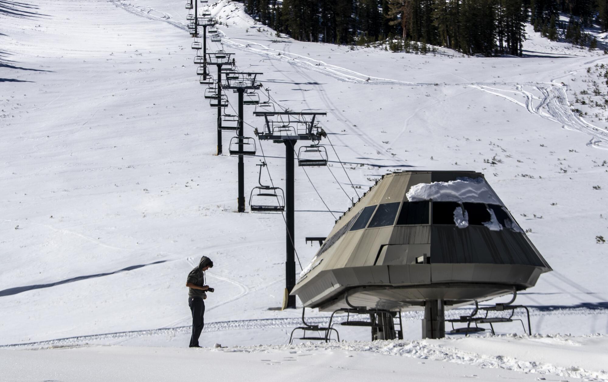 Florida resident Francisco Urrutia explores a deserted Mammoth Mountain ski area on Wednesday. 