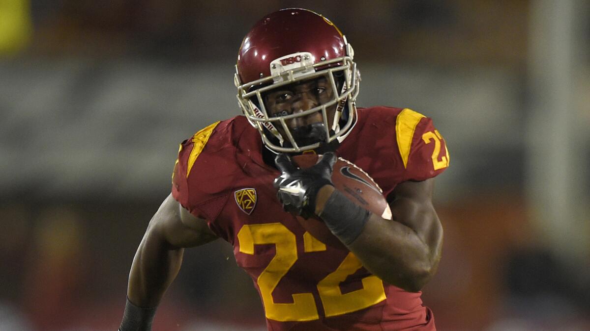 USC running back Justin Davis carries the ball during Saturday's 35-10 win over Oregon State.