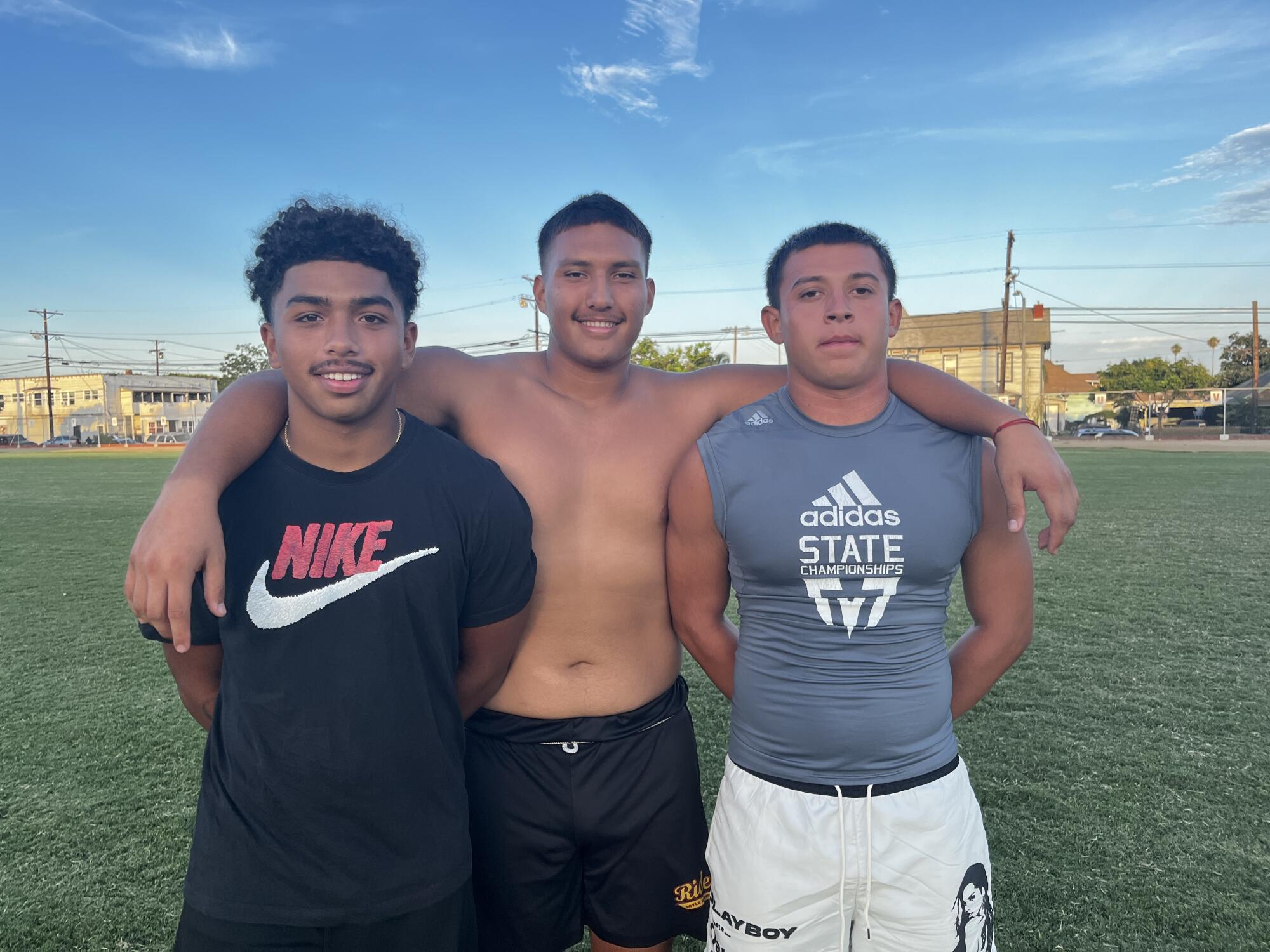 Roosevelt seniors Isiah Wright, left, Alexander Arroyo and Jared Andrade.