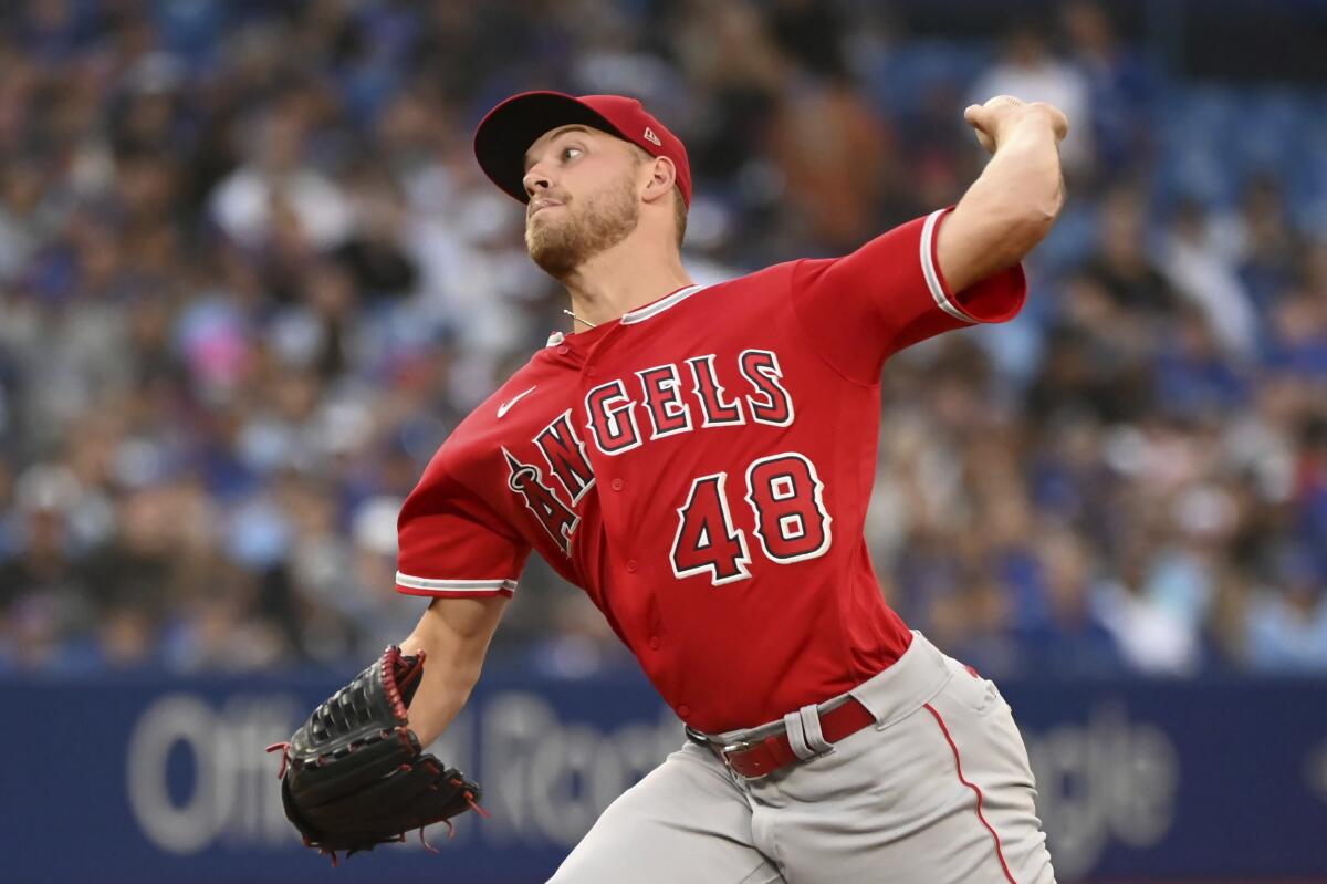 Angels starter Reid Detmers delivers in the first inning at Toronto on Aug. 26, 2022.
