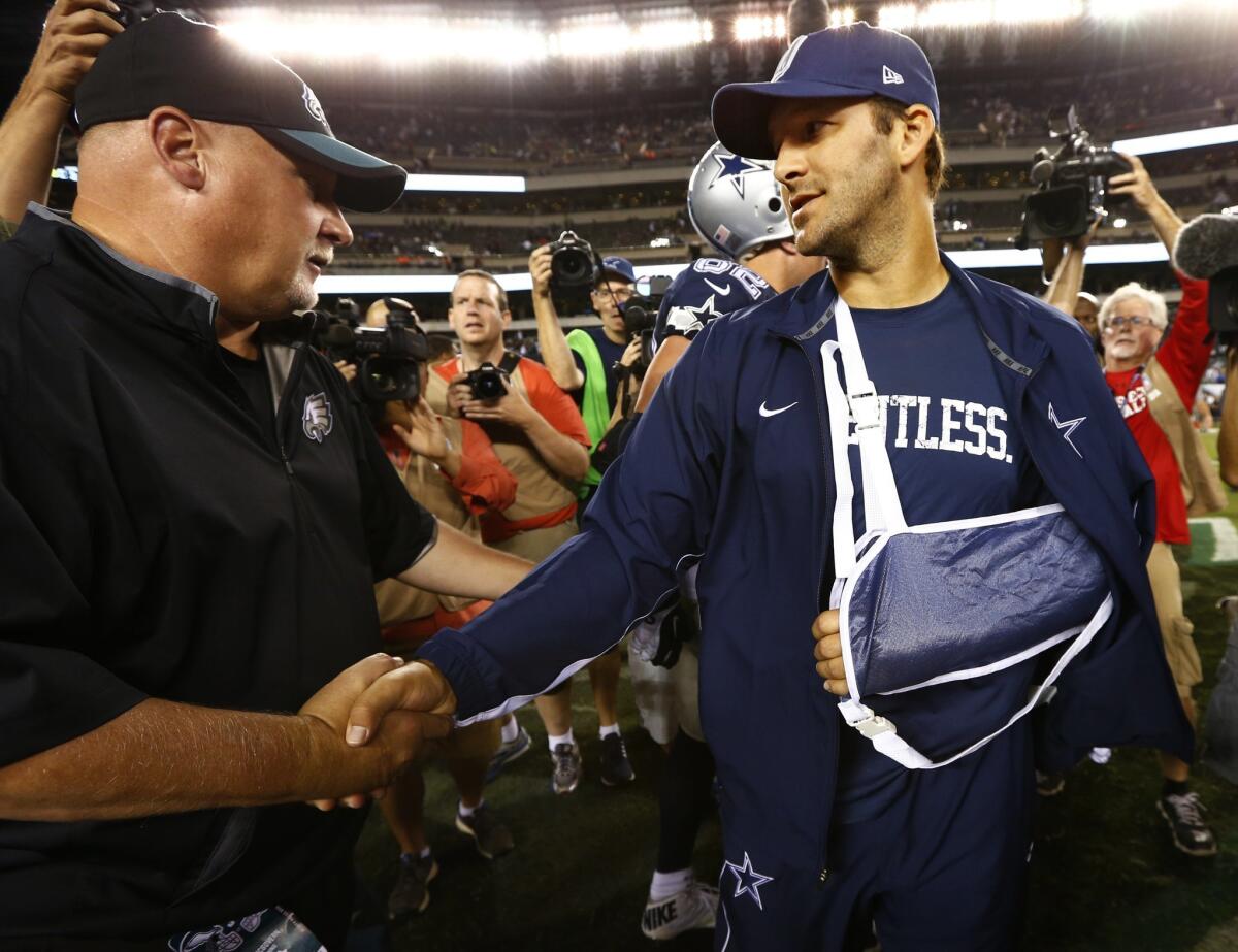 Dallas quarterback Tony Romo, right, shown shaking hands with Philadelphia assistant coach Bill McGovern, broke his collarbone against the Eagles on Sept. 20.