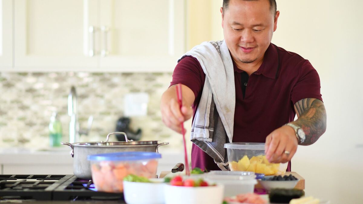 Chef Jet Tila packs his kids' lunch box at home in Los Angeles.