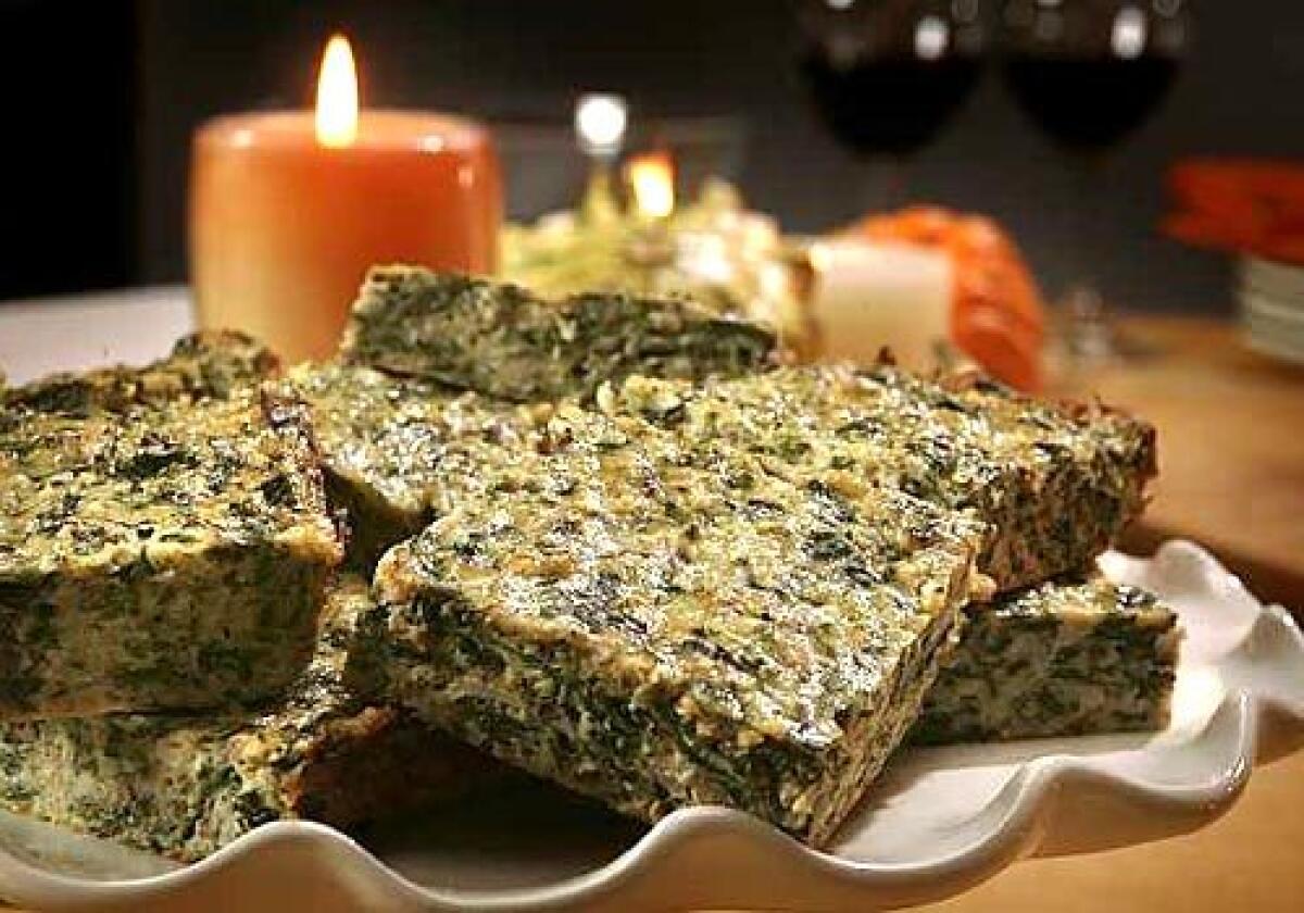 Cut small, these quiche-like collard squares are perfect hors doeuvres, but in big squares they are an excellent vegetarian entree.