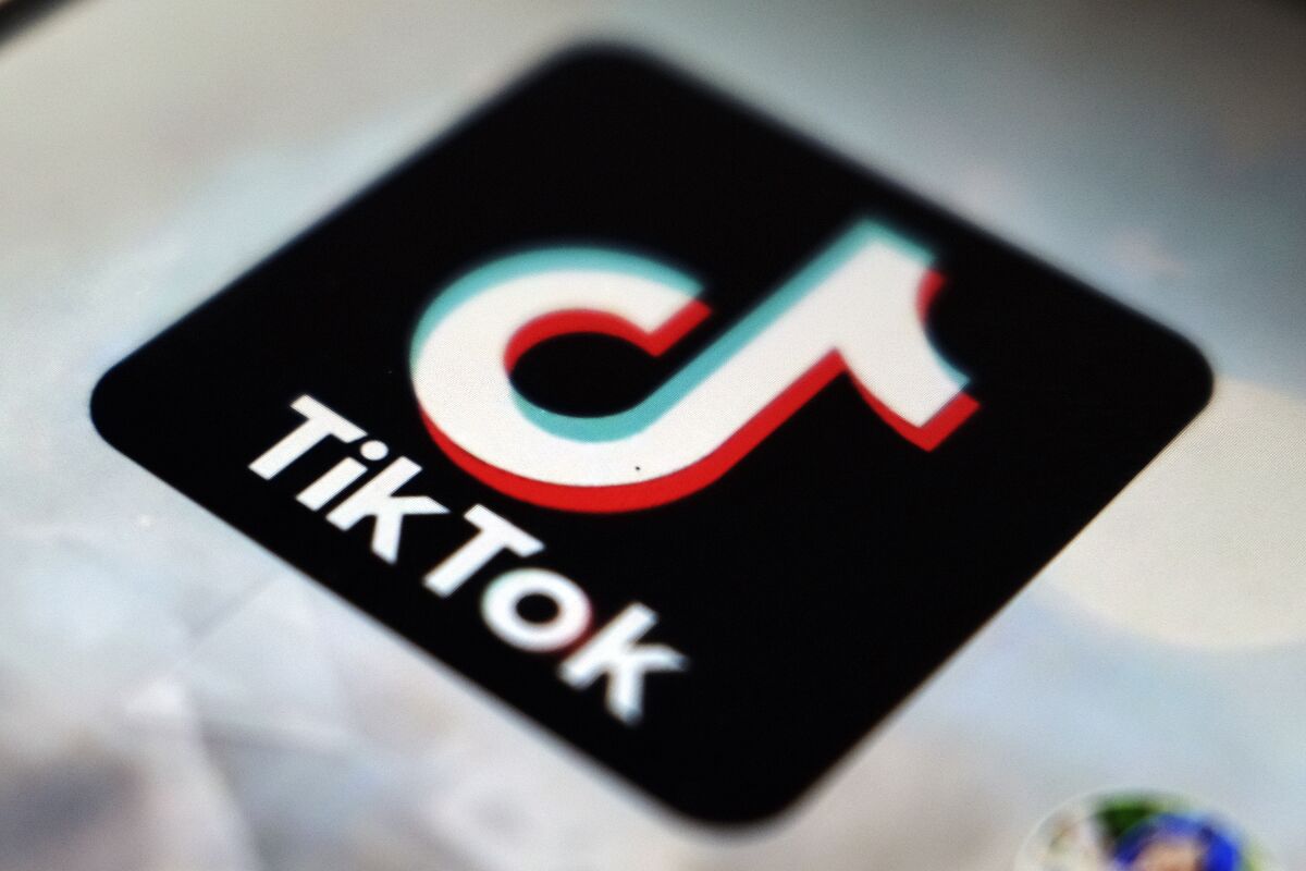 FILE - In this Monday, Sept. 28, 2020 filer, a logo of a smartphone app TikTok is seen on a user post on a smartphone screen, in Tokyo. TikTok is facing two EU data privacy investigations, one into its handling of children's personal data and another over its data transfers to China. Ireland's data privacy watchdog, which is TikTok's lead regulator in the European Union, said Tuesday that it has started two inquiries to examine whether the popular short video app has breached stringent EU data privacy regulations. (AP Photo/Kiichiro Sato, File)
