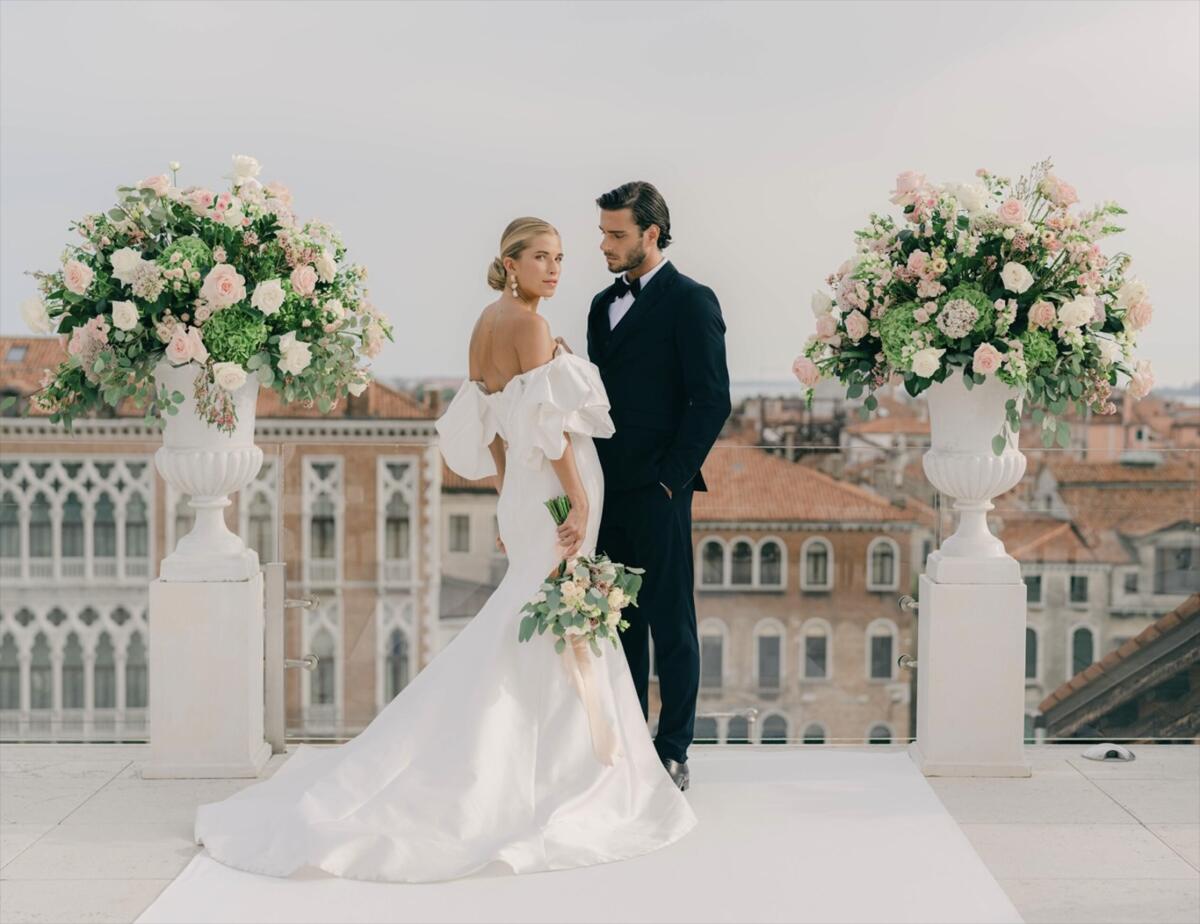 A bride and groom on the rooftop of Gritti Palace