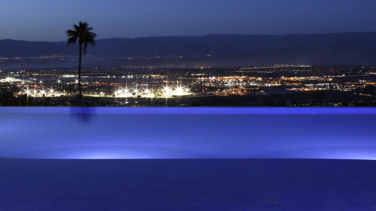 The twinkling lights of Palm Springs from the pool at the Bob Hope house.