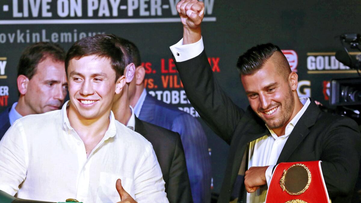 Gennady Golovkin, left, and David Lemieux are introduced to reporters at a news conference in Los Angeles on Thursday.