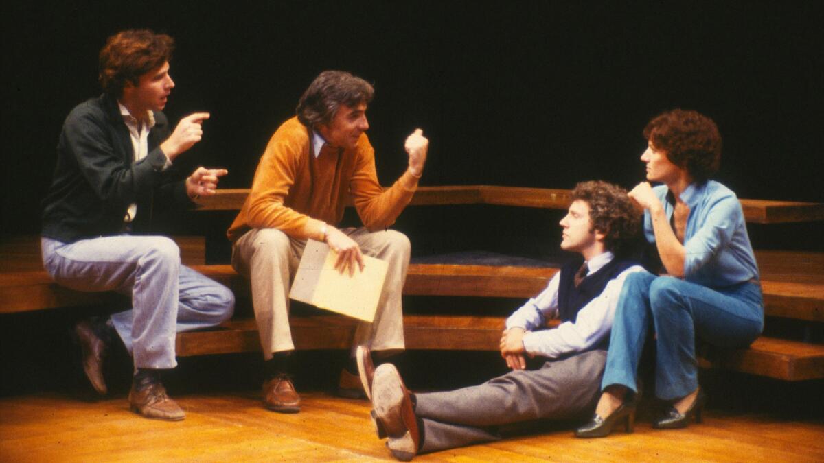 Sign language interpreter Gary Charm and Mark Taper Forum artistic director Gordon Davidson, left, with actors John Rubinstein and Phyllis Frelich during rehearsal for “Children of a Lesser God” in 1979.
