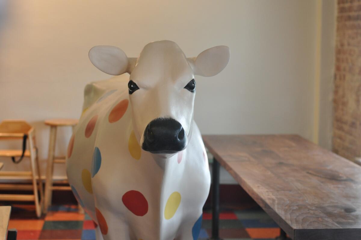 The life-size cow upstairs at the new Moo on Mission in Pasadena