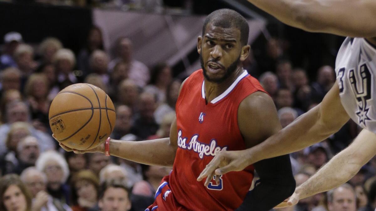 Clippers point guard Chris Paul drives to the basket during a game against the San Antonio Spurs on Jan. 31.