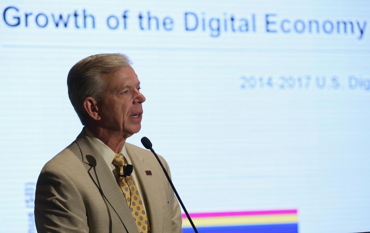 Lowell McAdam, chairman and CEO of Verizon Communications, speaks at a conference held May 13 in Arlington, Va.