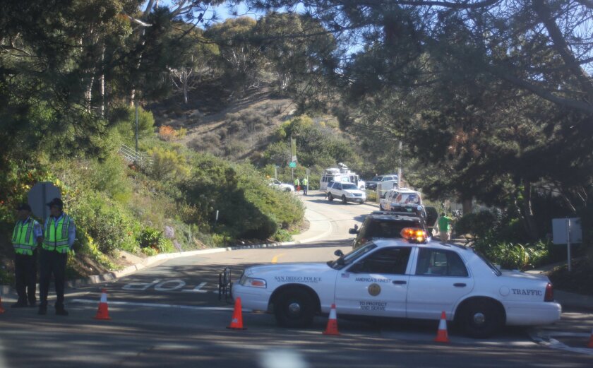 Police block an entrance to the crime scene off La Jolla Shores Drive Monday morning. Photo by Ashley Mackin