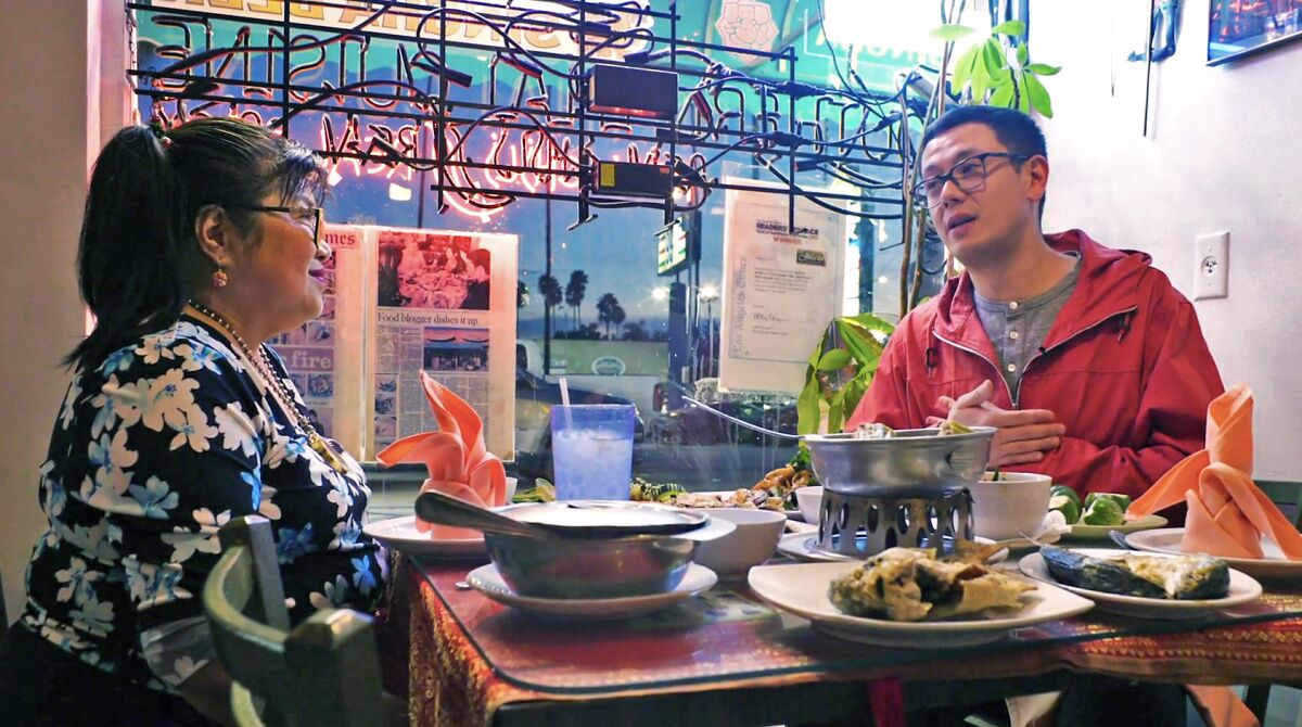 A scene from Los Angeles Times' new show "Off Menu" with Lucas Kwan Peterson. In episode one, Peterson hangs out with Jitlada's Jazz Singsanong.