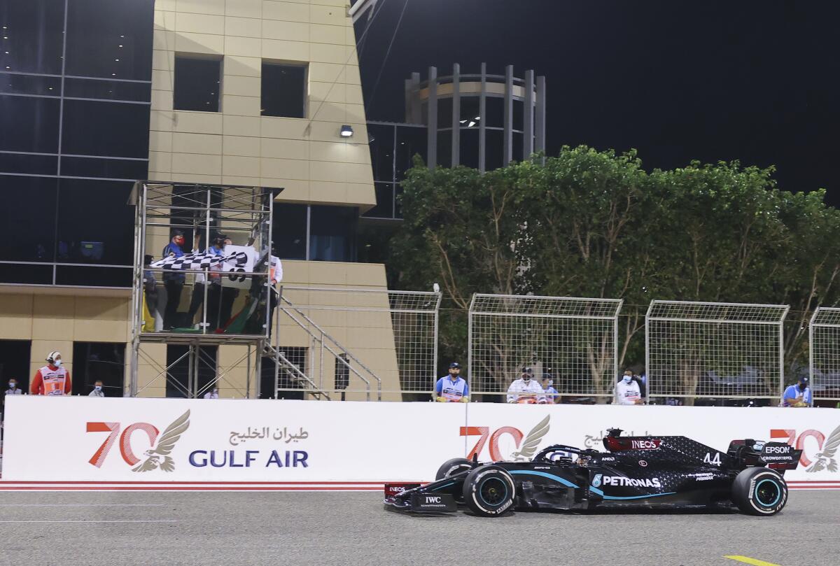 Mercedes driver Lewis Hamilton of Britain wins the Formula One Bahrain Grand Prix in Sakhir, Bahrain, Sunday, Nov. 29, 2020. (Giuseppe Cacace, Pool via AP)