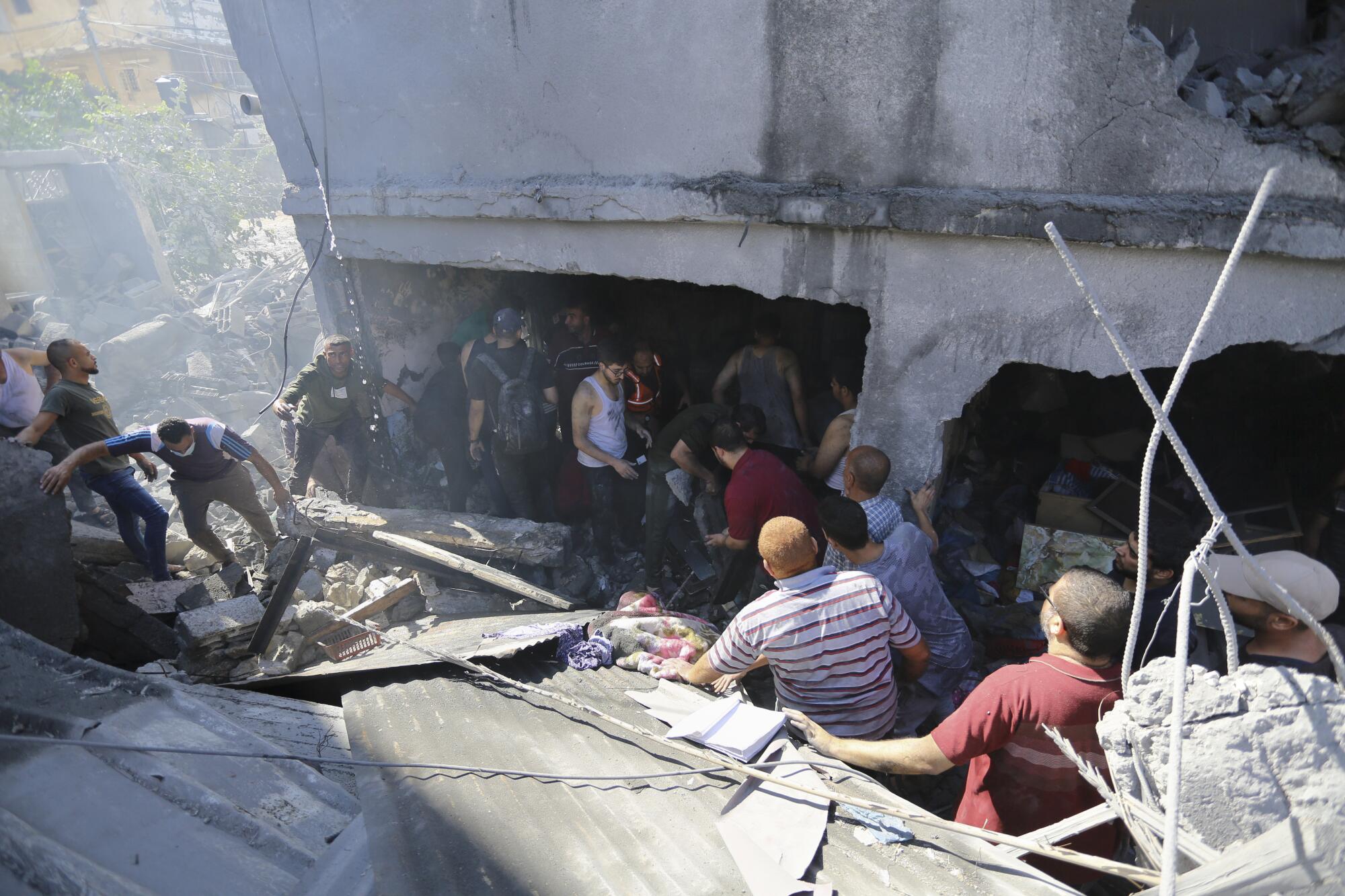 Palestinians looking for survivors after Israeli airstrikes on Gaza City