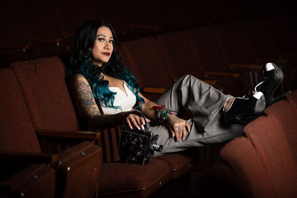 Nathaly Alvizures inside the Saville Theatre at San Diego City College