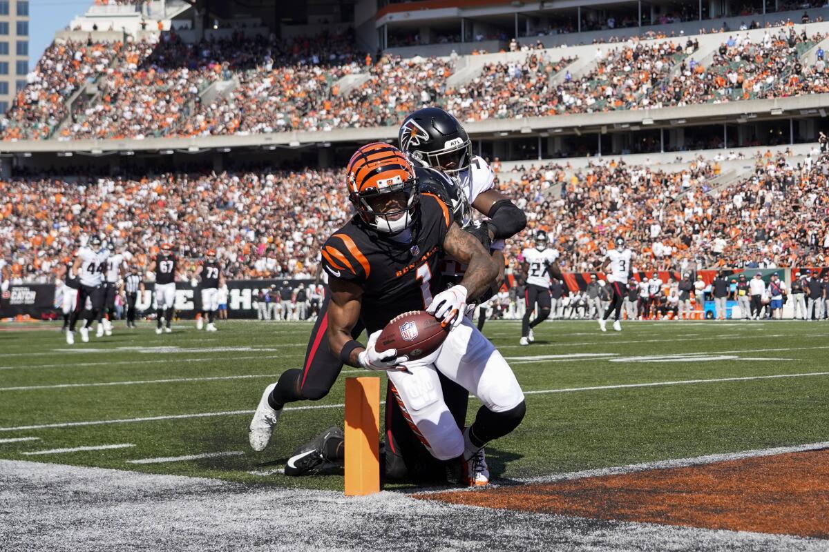 Cincinnati Bengals wide receiver Ja'Marr Chase makes a catch for a touchdown against the Atlanta Falcons defense.
