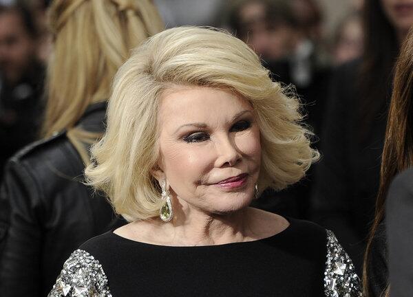 Joan Rivers chained herself to a Costco shopping cart Tuesday evening in Burbank. The matriarch of sharp-tongued fashion criticism and plastic surgery enthusiasm was apparently angry that the bulk superstore refused to sell her new book, "I Hate Everyone -- Starting With Me," which displays "cuss words" on the back. MORE: Full story