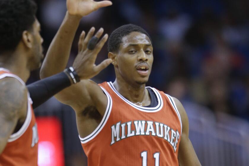 Milwaukee Bucks guard Brandon Knight, right, is congratulated by teammate O.J. Mayo during a win over the Orlando Magic on Jan. 29.