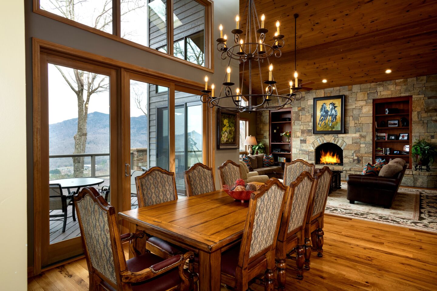 A great room with a stone fireplace anchors NASCAR legend Rusty Wallace's home.