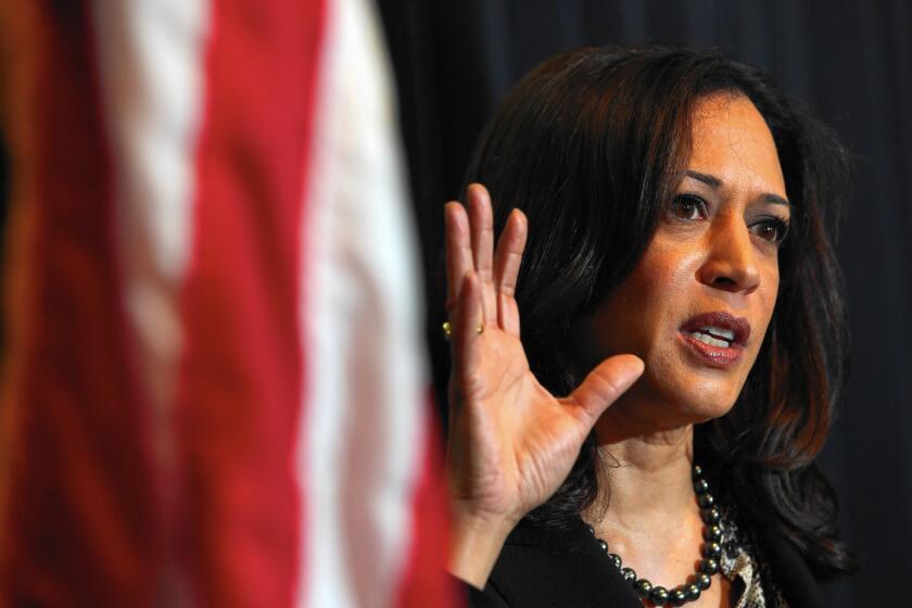 California Atty. Gen. Kamala Harris, whose aide Brandon Kiel is accused of forming a fictitious police force with two people, has received regular briefings on the case since his arrest.