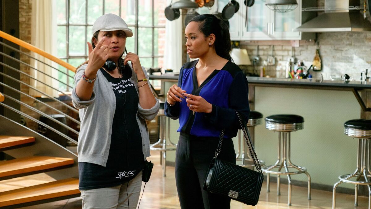 Latinx director Aurora Guerrero, left, instructs actress Dawn-Lyen Gardner in an episode of "Queen Sugar."