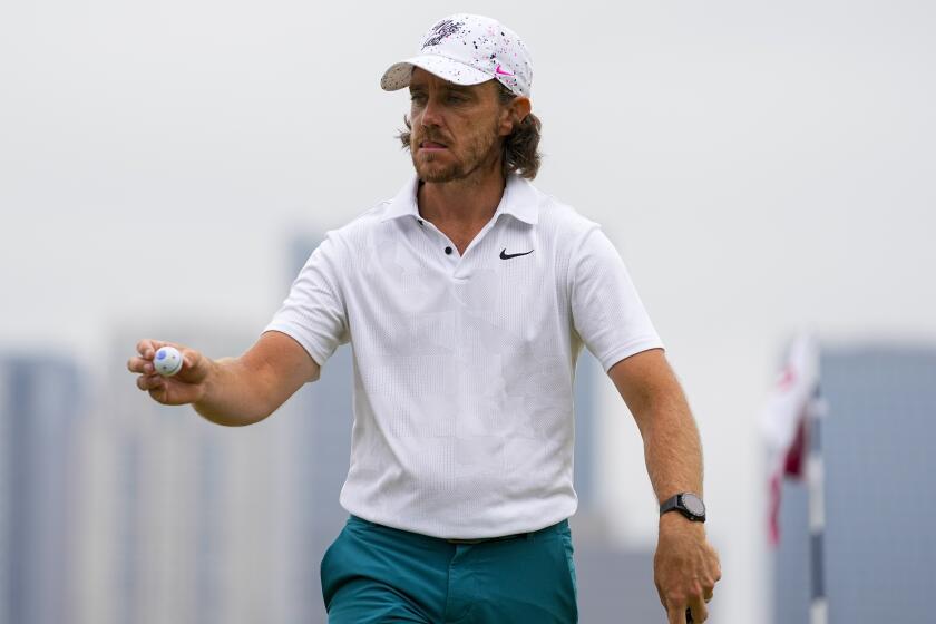 Tommy Fleetwood waves after his putt on the 12th hole during the final round of the U.S. Open.