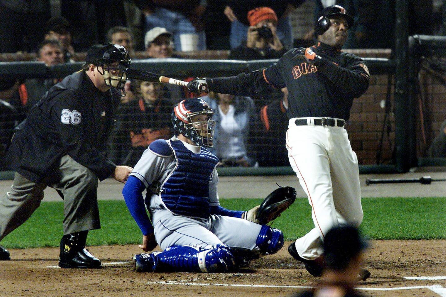 Bonds ties Ruth at 714* Bonds' second-inning shot ties the Babe