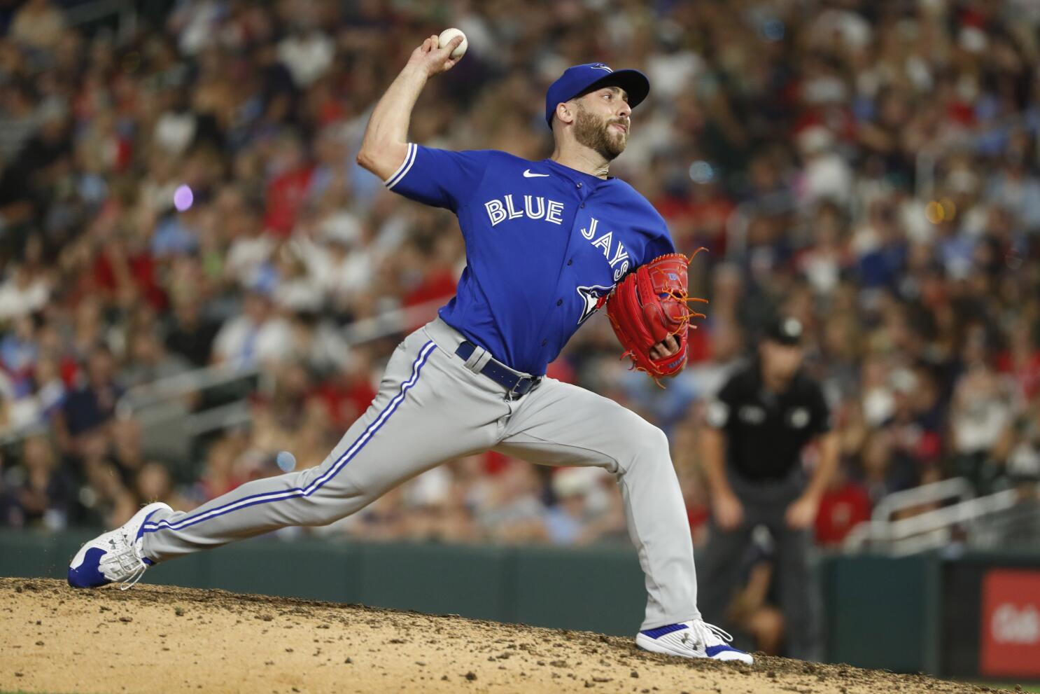 Kevin Gausman catches first pitch to kick off Blue Jays' Pride celebration