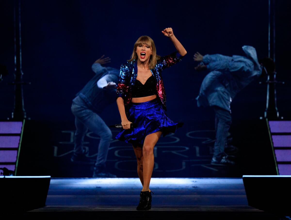 Taylor Swift rocks onstage at Staples Center on Tuesday night in Los Angeles.