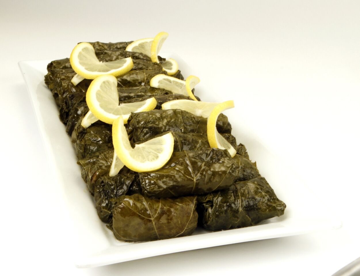 Go ahead and make an extra batch of these grape leaves -- they go quickly.