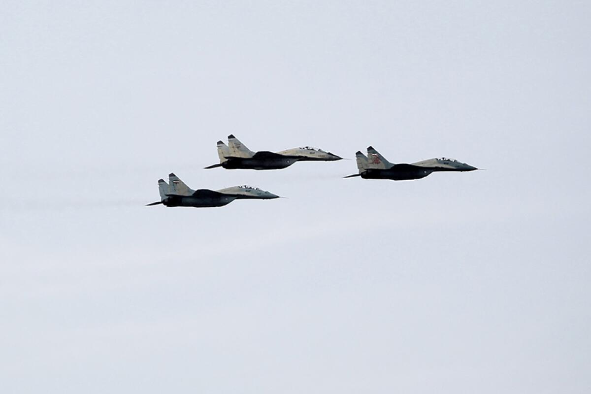 Iranian MIG-29 fighter jets are flown during the Army Day parade in Tehran in 2013.