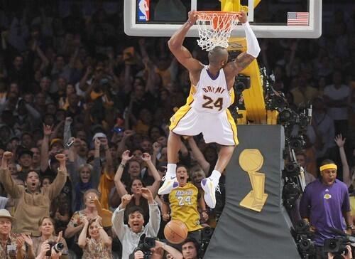 Lakers guard Kobe Bryant dunks after knocking the ball away from Paul Pierce and getting the feed from teammate Lamar Odom late in the fourth quarter of Game 5 of the NBA Finals. The Lakers won, 103-98.