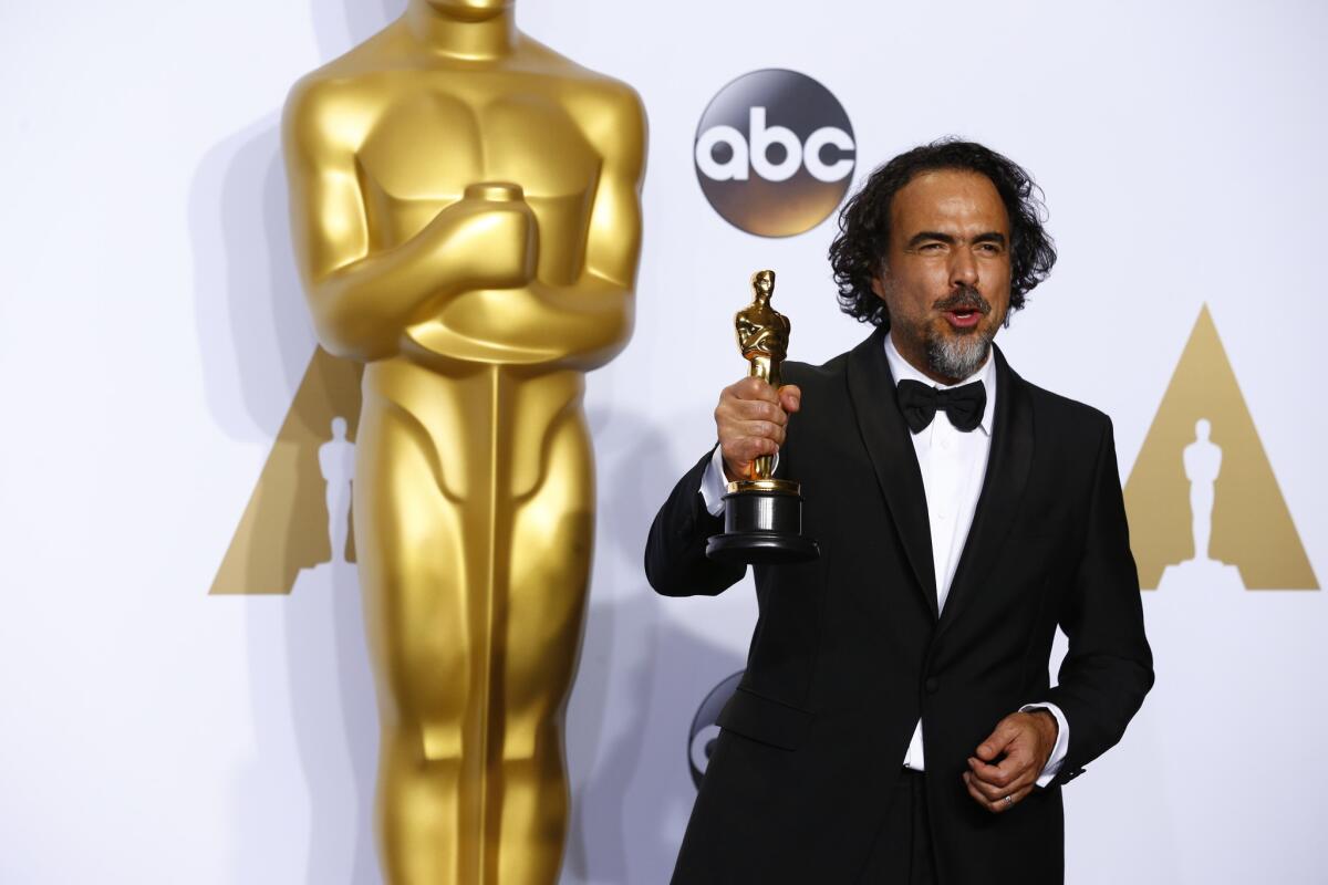 Alejandro G. Iñárritu with his Oscar backstage at the 88th Academy Awards.