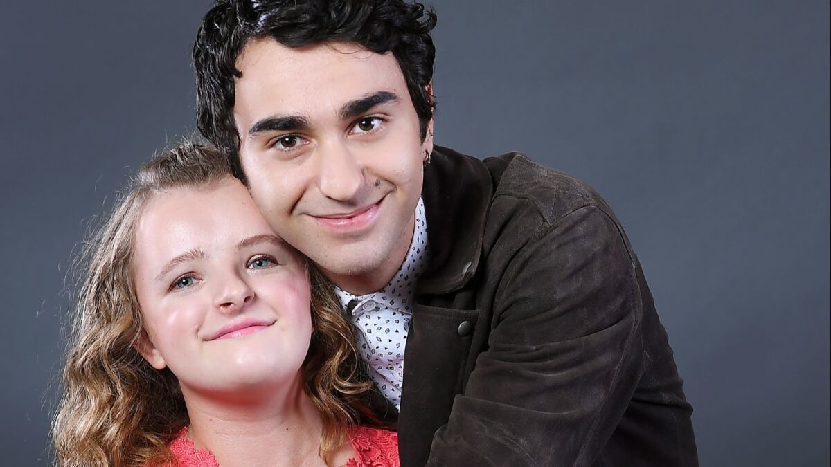 Actors Milly Shapiro, left, and Alex Wolff of 'Hereditary' are photographed in Beverly Hills a year after filming the harrowing hit horror movie, in theaters now.