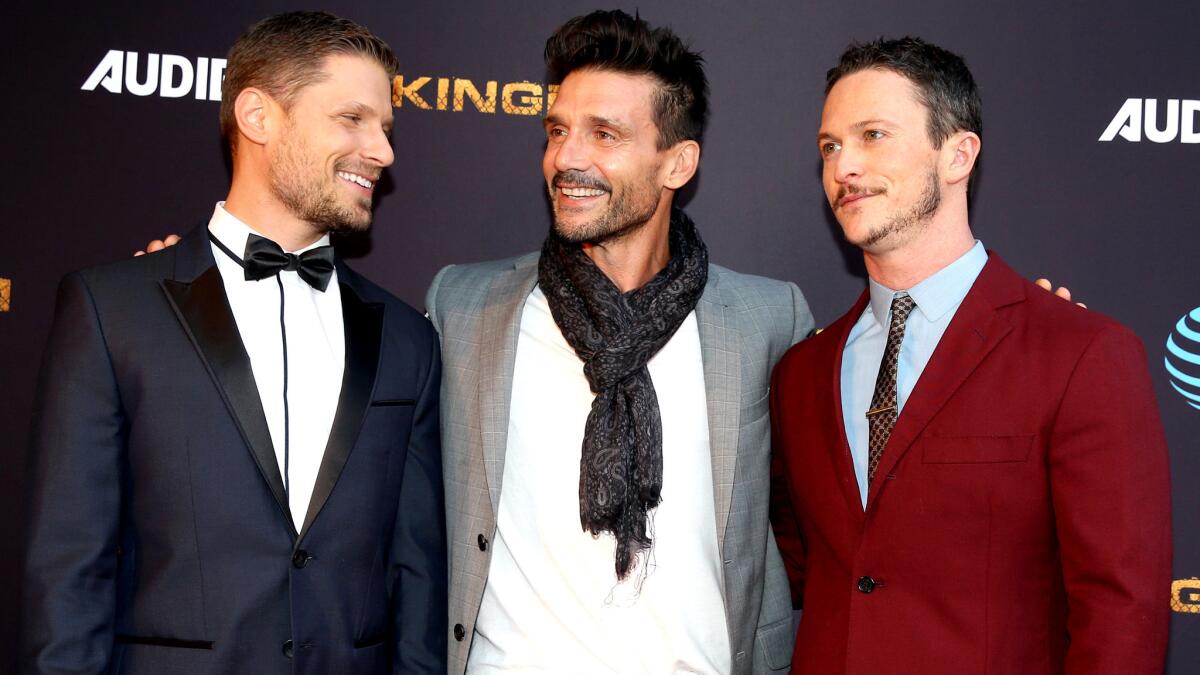 Frank Grillo is flanked by co-stars Matt Lauria, left, and Jonathan Tucker during an event for "Kingdom" on May 25 in Los Angeles.